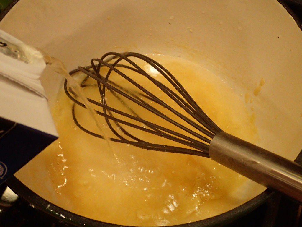 Whisk in chicken broth