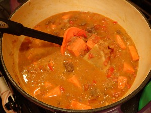 Let simmer until sweet potatoes are cooked