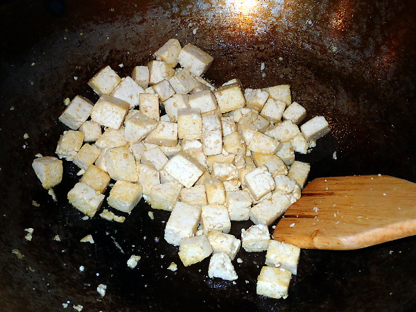 Stir-fry tofu until browned