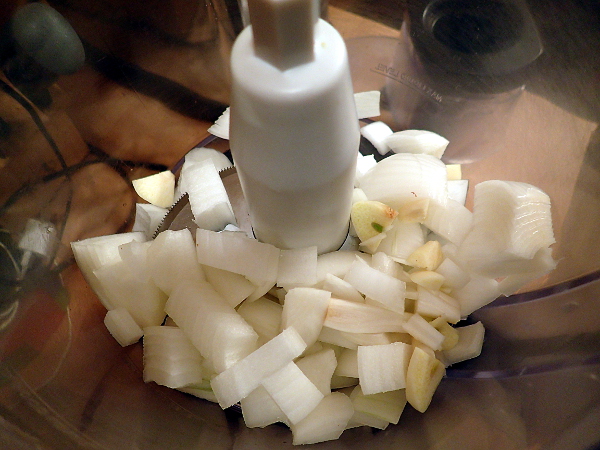 Place onion and garlic in food processor