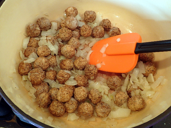 Add meatballs to onions