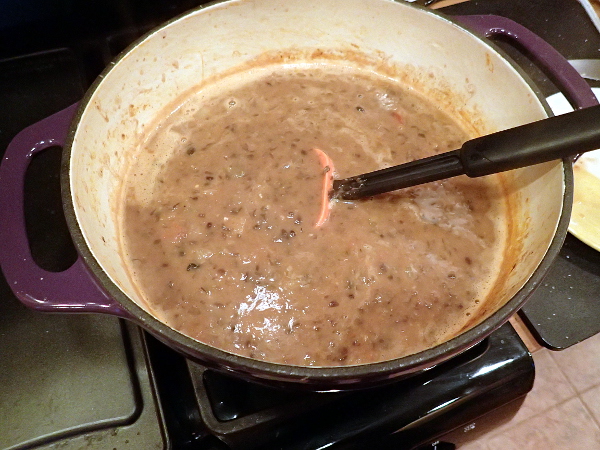 Pour in final can of black beans