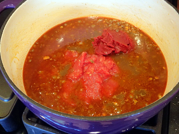 Add tomatoes and tomato paste